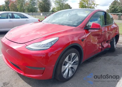 2022 Tesla Model Y Long Range Dual Motor All-Wheel Drive z USA, uszkodzony, nr VIN 7SAYGDEE1NF441562